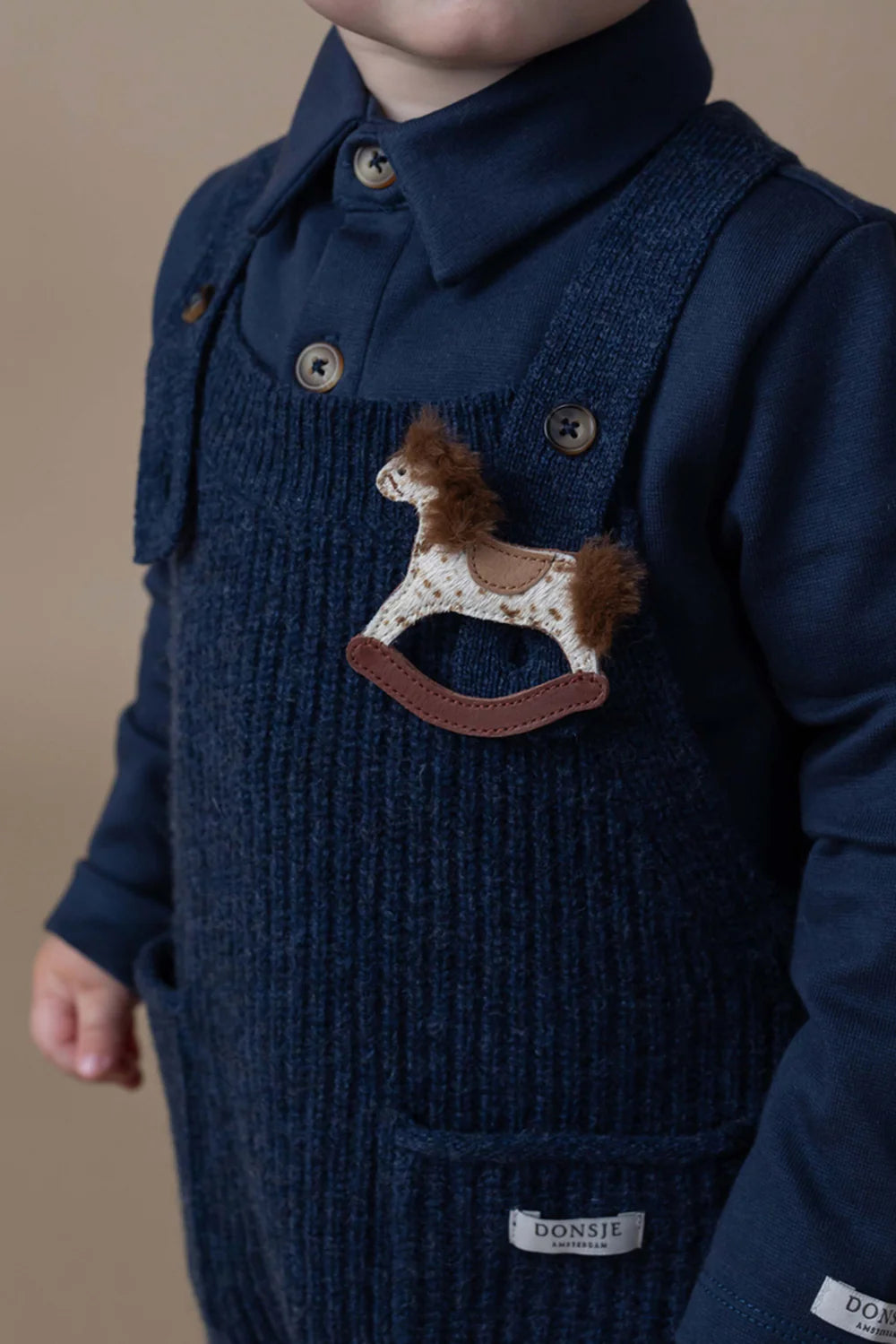 Donsje - clip cavalli a dondolo