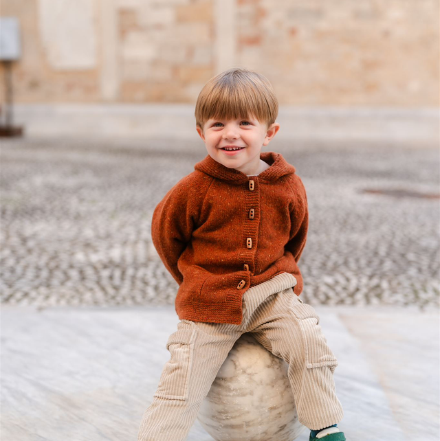 DrKid - cardigan mattone con cappuccio e pon pon