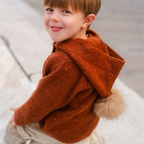 DrKid - cardigan mattone con cappuccio e pon pon